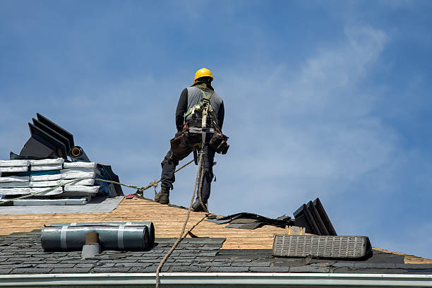 Professional Metal Roofing technician working in Oxford, MA